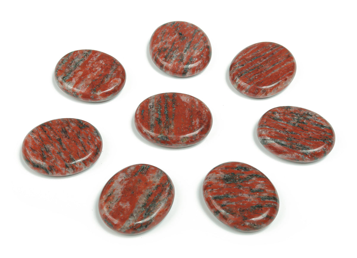 Red sesame jasper flat gemstone slab showing natural red and beige patterns, smooth surface, and rectangular shape.