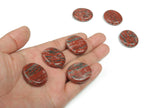 Red sesame jasper flat gemstone slab with natural patterns, measuring 30x25x7 mm, showcasing its vibrant red and earthy tones.