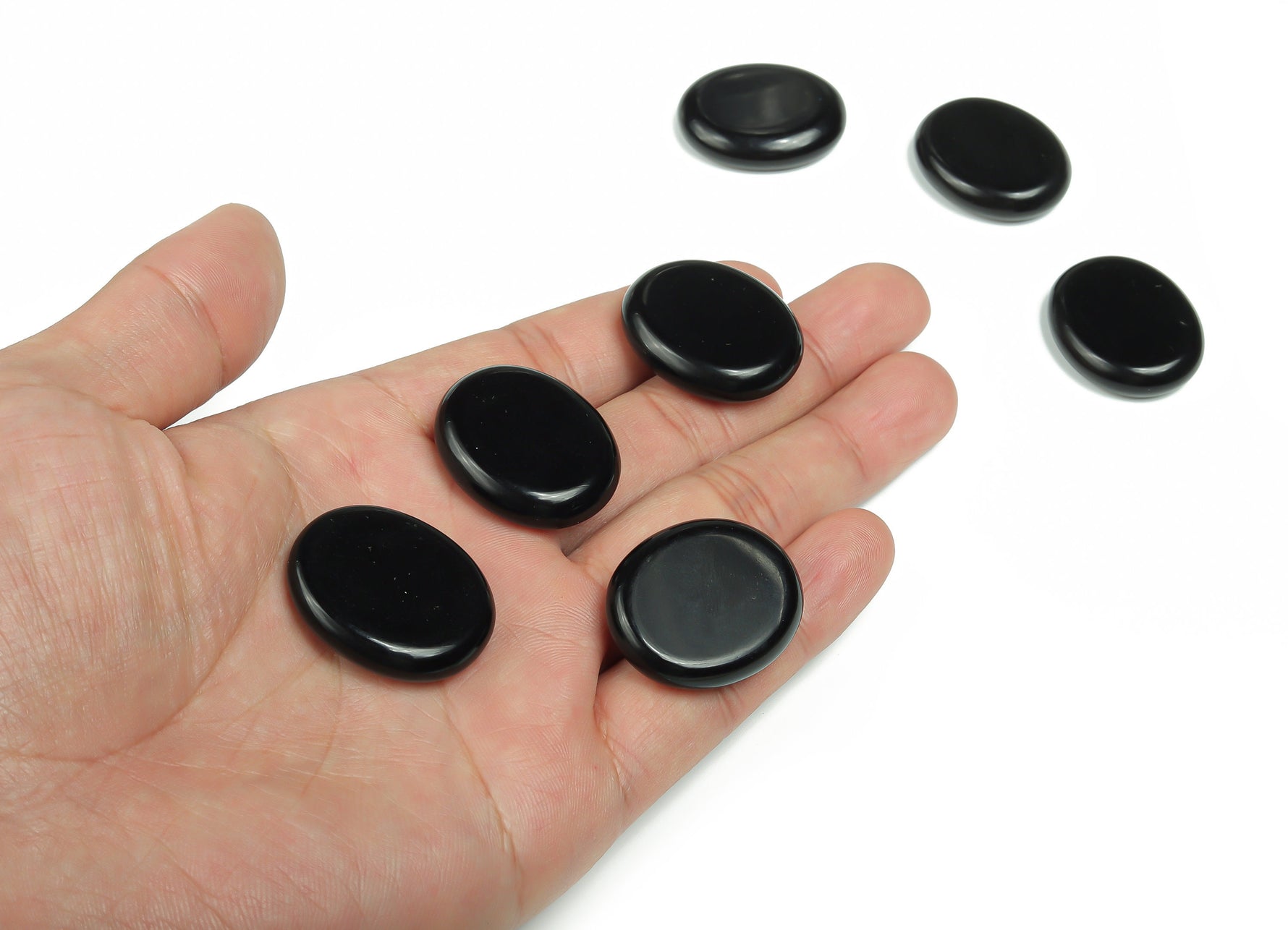 Obsidian flat gemstone slab from GemstoneGO, measuring 30x25x7 cm, showing polished black stone with natural veining and texture.