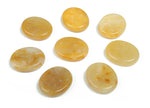 Yellow jade flat gemstone slab, 30x25x7 cm, from GemstoneGO, showing smooth polished surface and vibrant yellow color.