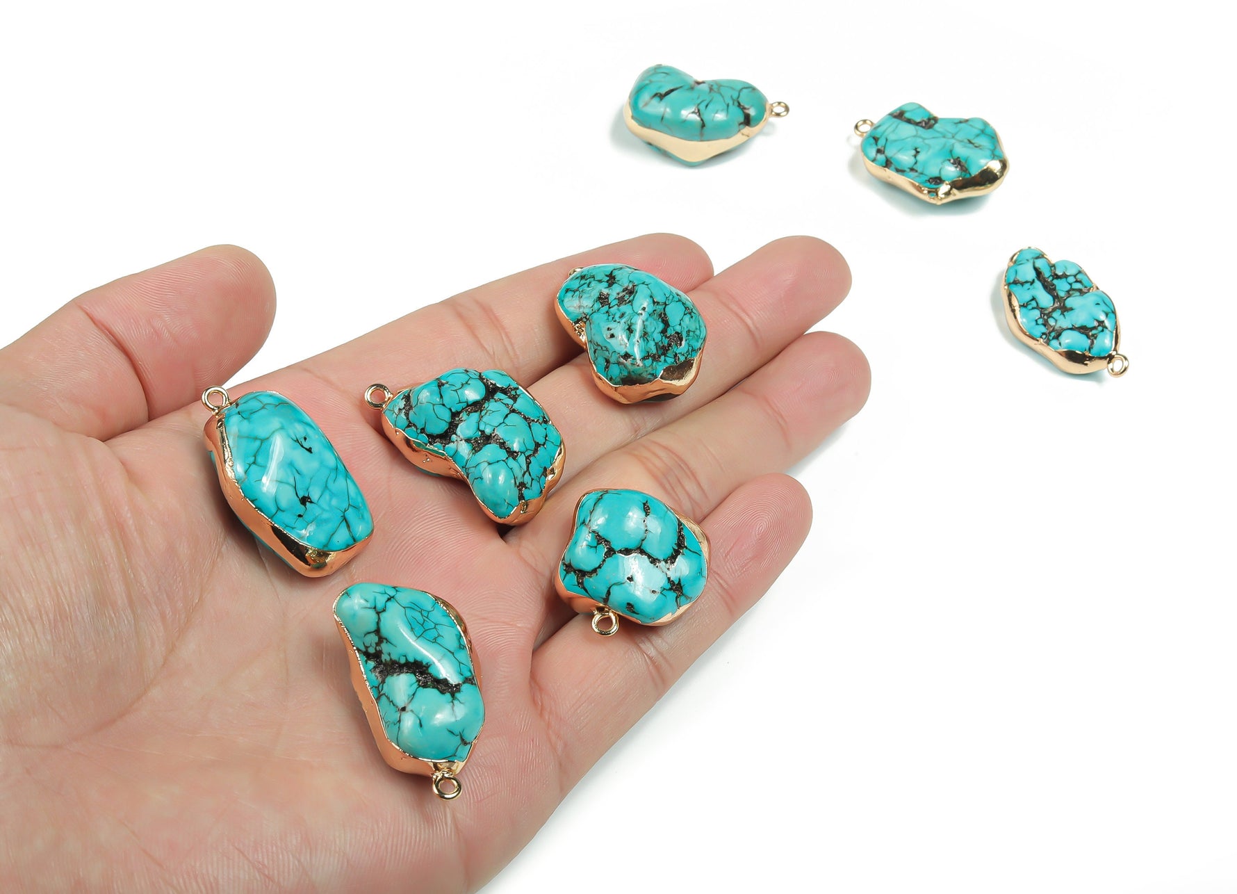 Turquoise crystal pendant with healing stones from GemstoneGO, featuring a polished turquoise gemstone on a silver chain.