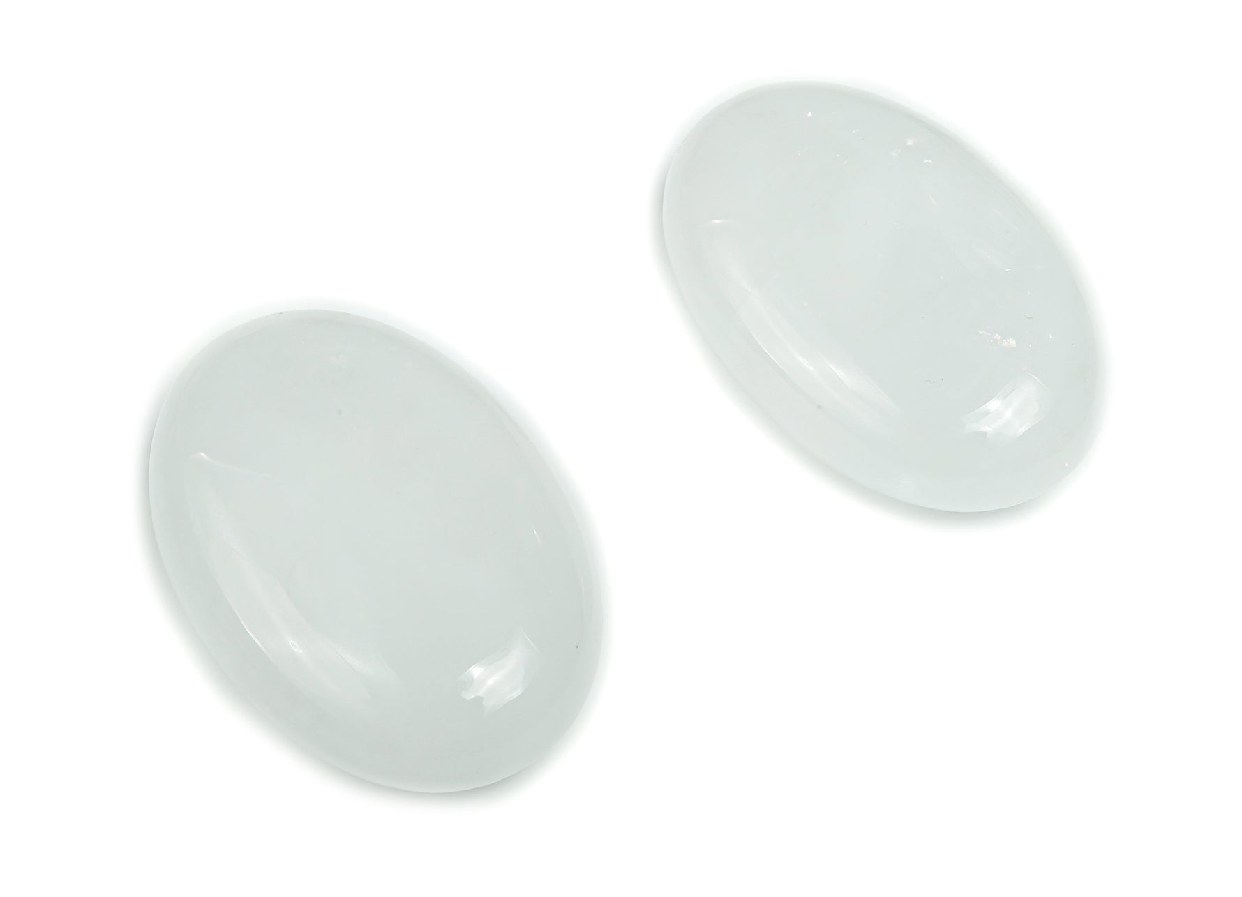 Clear Quartz palm gemstone spa stone, 60x40mm, from GemstoneGO, showing polished, smooth surface and natural crystal clarity.