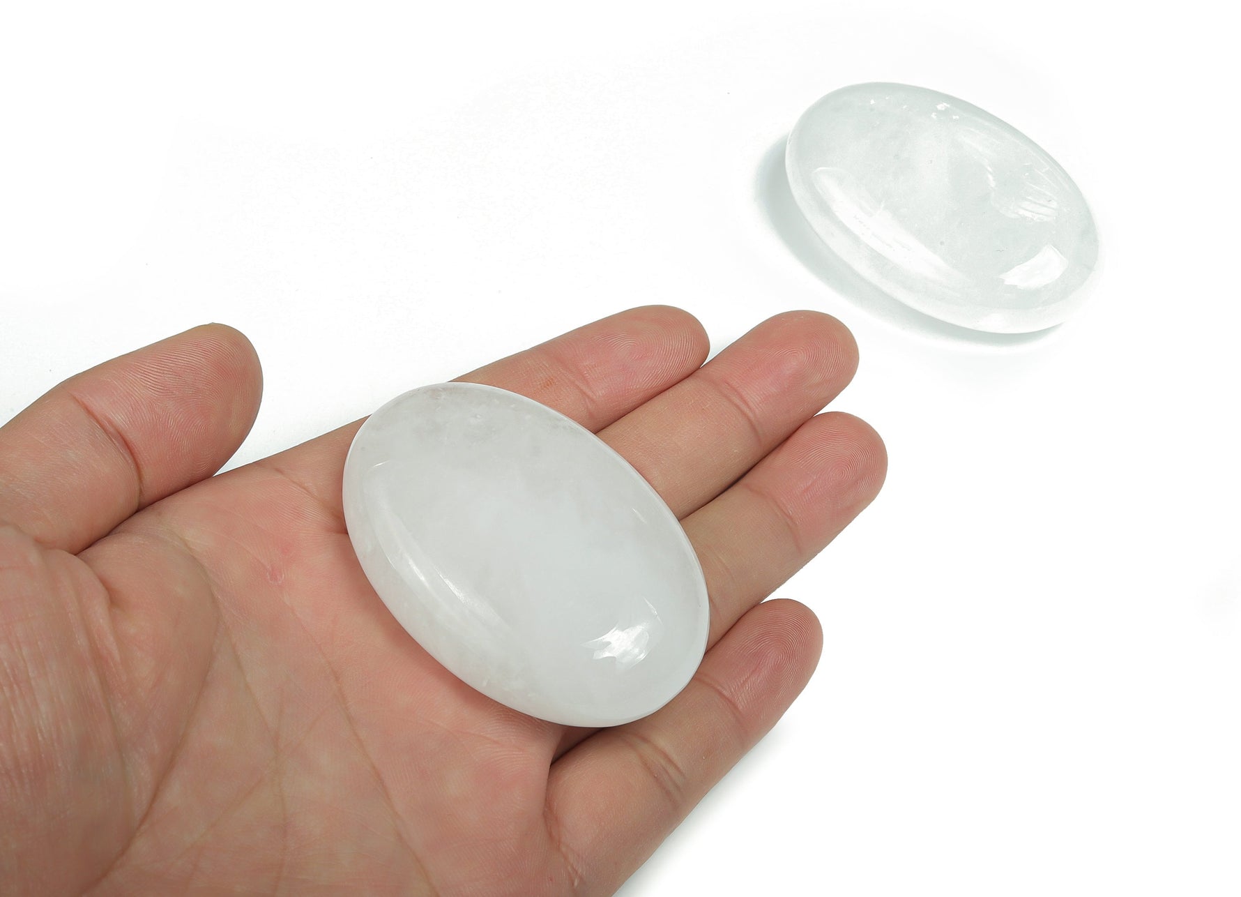 Clear quartz palm gemstone spa stone, 60x40mm, smooth polished nature-inspired healing crystal from GemstoneGO.