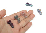 Polished fluorite nine-tailed fox gemstone carving from GemstoneGO, showcasing vibrant purple and green colors with detailed craftsmanship.