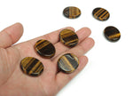 Tiger Eye flat gemstone slab from GemstoneGO, measuring 30x25x7 mm, showcasing its rich golden-brown chatoyancy.