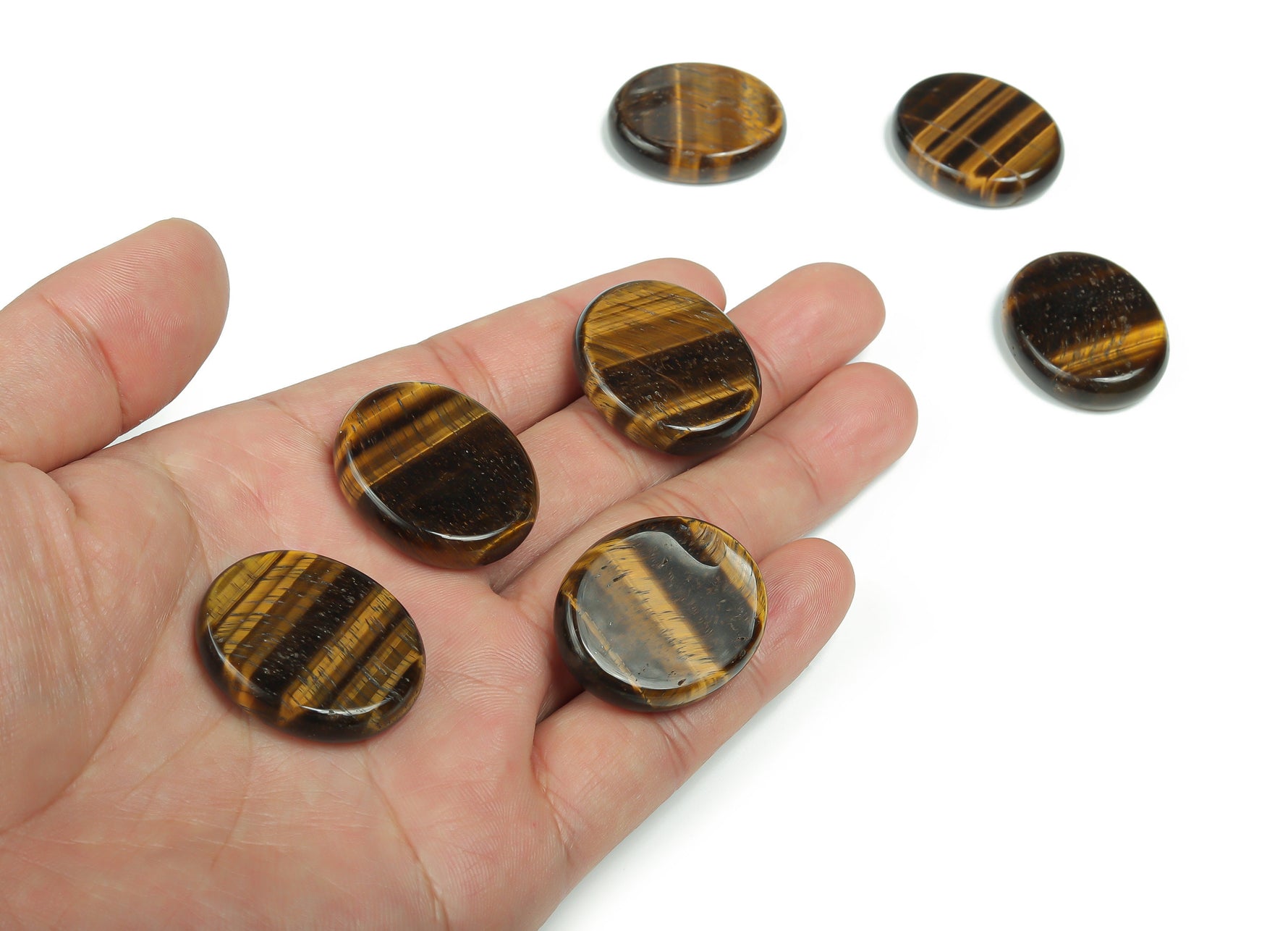 Tiger Eye flat gemstone slab from GemstoneGO, measuring 30x25x7 mm, showcasing its rich golden-brown chatoyancy.