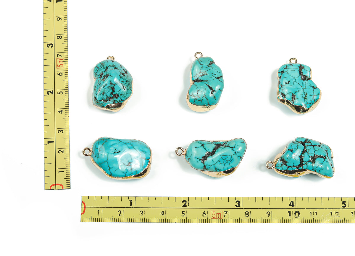 Turquoise crystal pendant with healing stones from GemstoneGO, featuring a polished turquoise gemstone on a silver chain.
