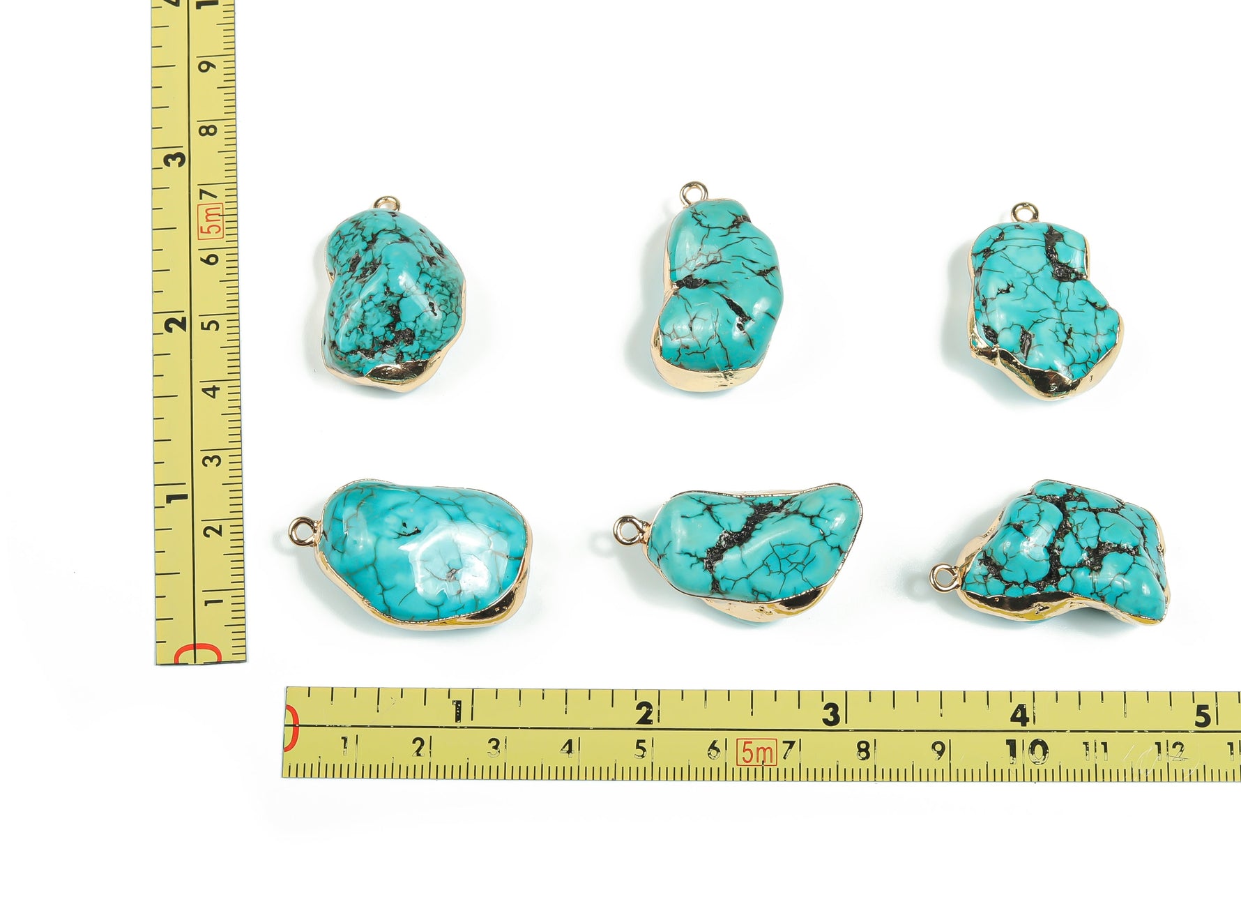Turquoise crystal pendant with healing stones from GemstoneGO, featuring a polished turquoise gemstone on a silver chain.