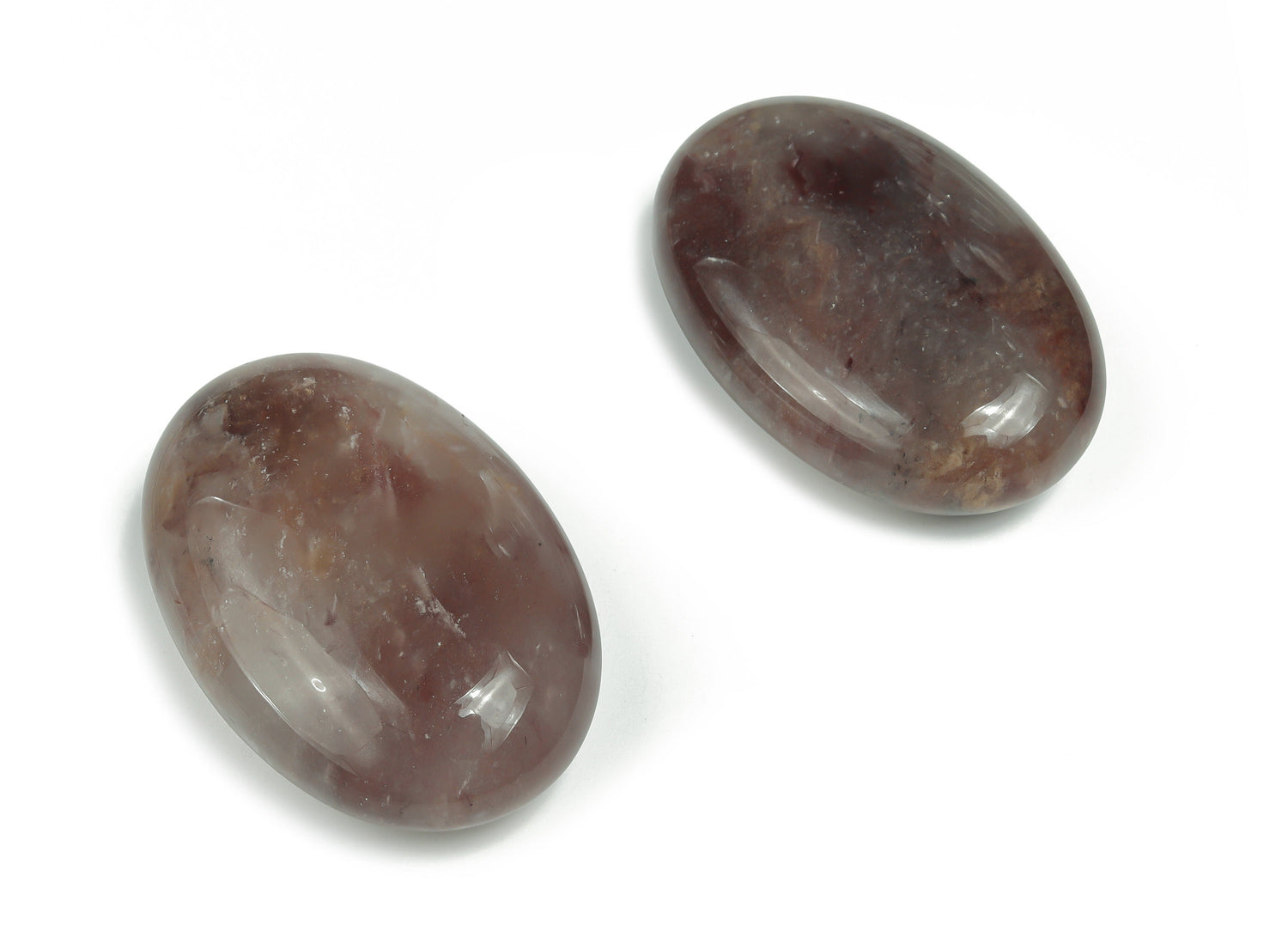 Strawberry Quartz palm gemstone spa stone, 60x40mm, featuring a smooth, polished surface with natural pink and red hues.