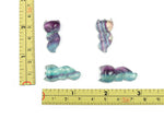 Fluorite Nine Tailed Fox gemstone carving from GemstoneGO, detailed multicolored stone sculpture of a fox with nine tails.