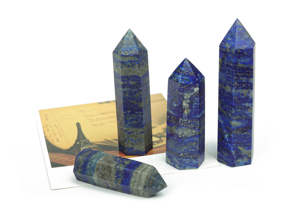 Lapis Lazuli obelisk tower crystal from GemstoneGO with deep blue and gold flecks, polished to a smooth finish.