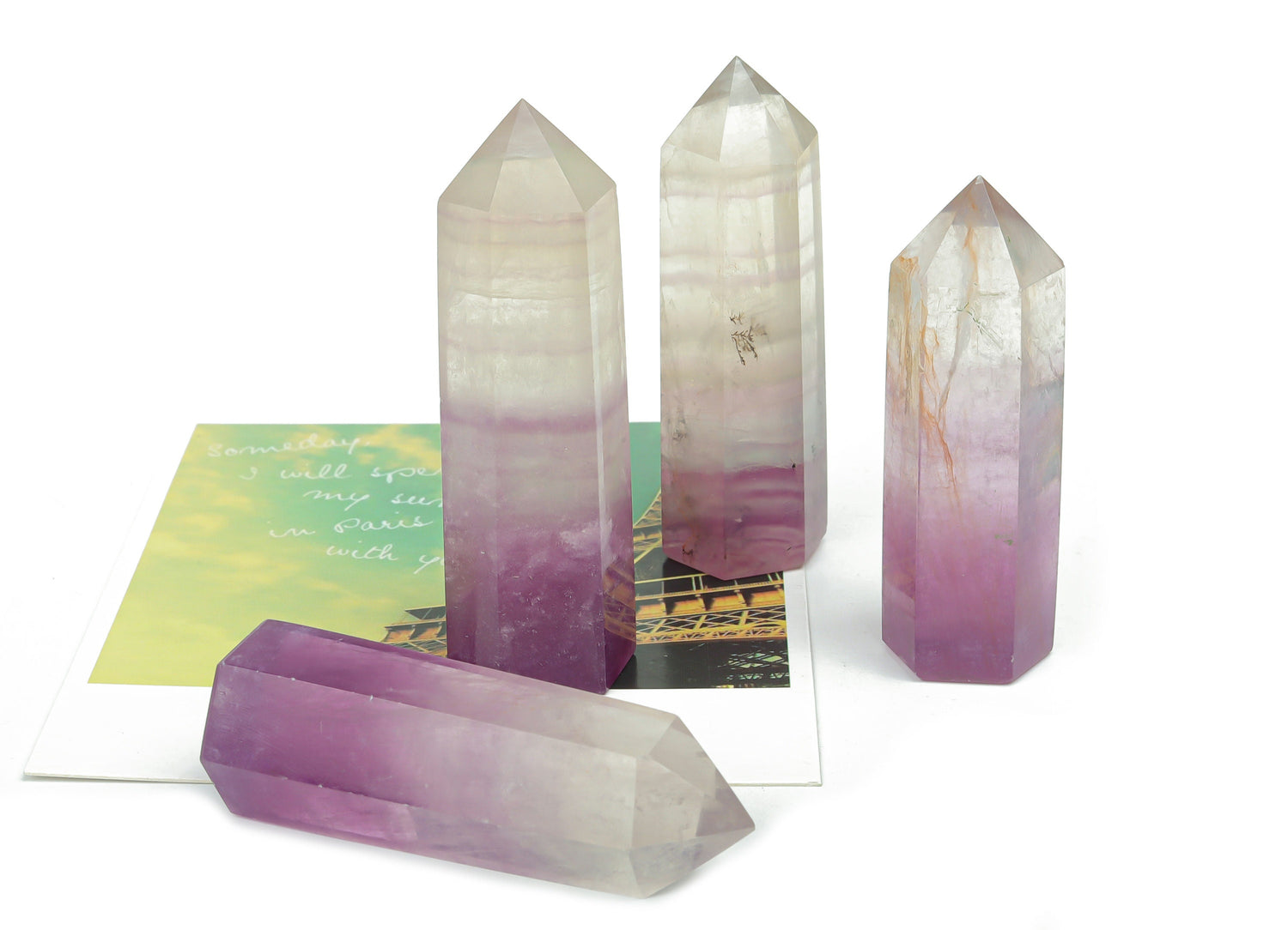 Watermelon Fluorite obelisk tower crystal from GemstoneGO, featuring vibrant green and pink hues and polished stone surface.
