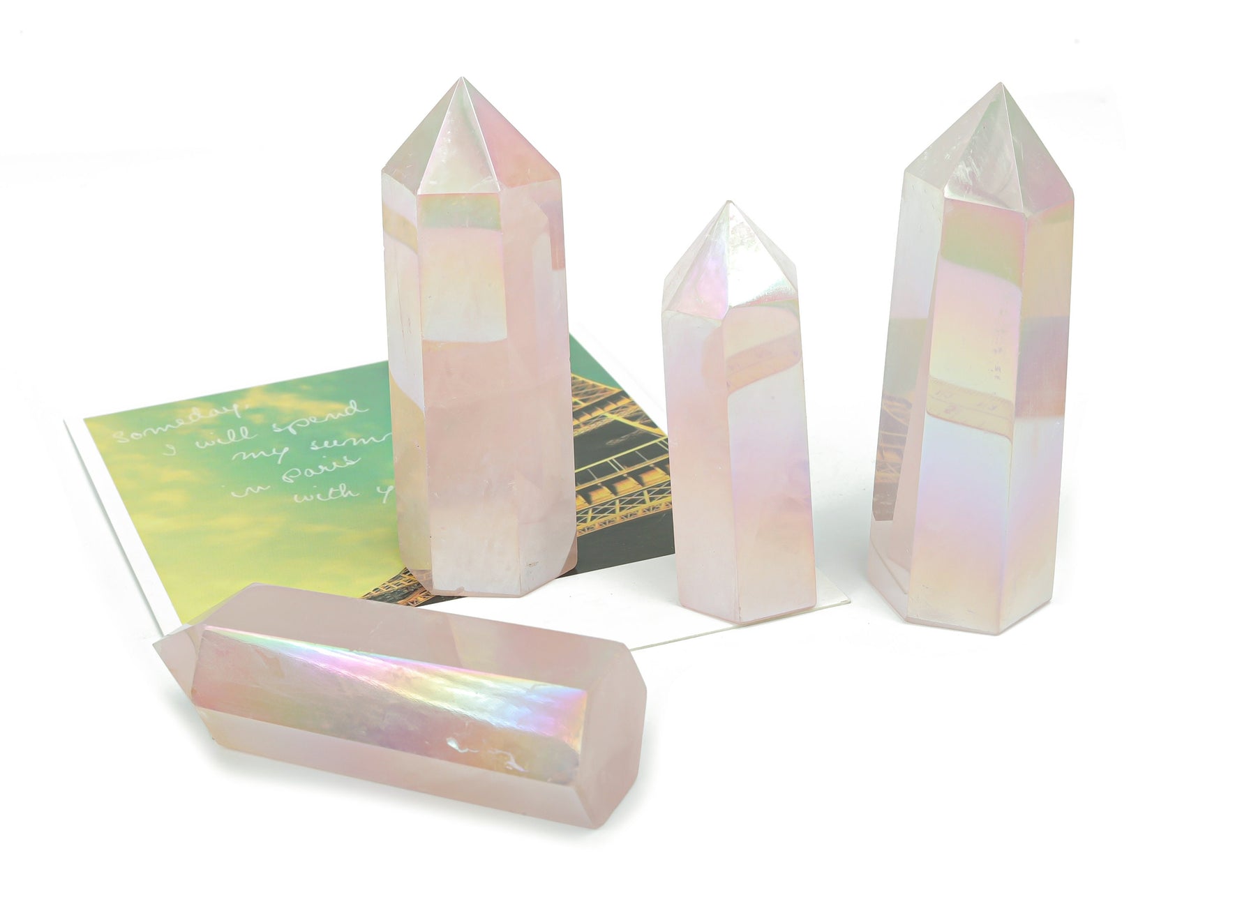 Angel Aura Rose Quartz obelisk tower crystal from GemstoneGO featuring a luminous pink gemstone with iridescent sheen.