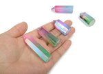 Rainbow Aura Quartz obelisk tower crystal from GemstoneGO, showcasing vibrant rainbow colors and polished stone with a pointed top.