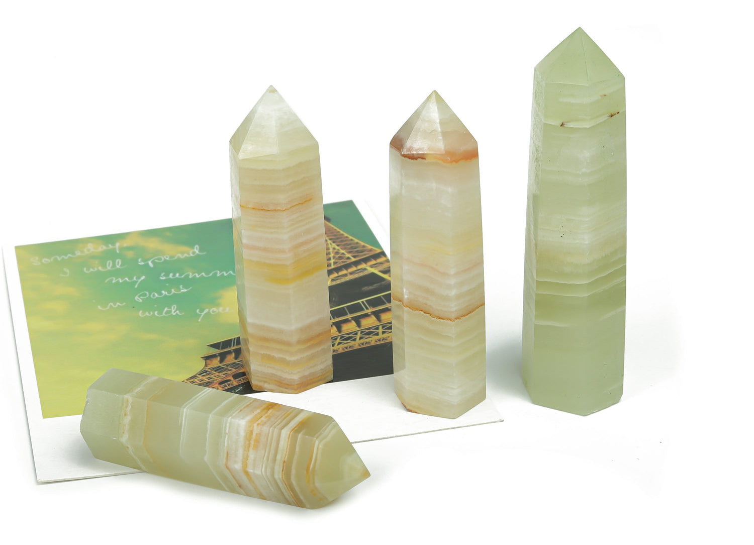 Afghanistan Jade Obelisk Tower Crystal from GemstoneGO, featuring a polished green gemstone obelisk with natural stone patterns.