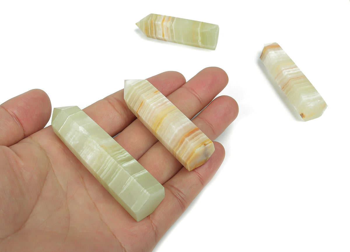 Afghanistan Jade Obelisk Tower Crystal by GemstoneGO, featuring a polished green gemstone obelisk with natural stone patterns.