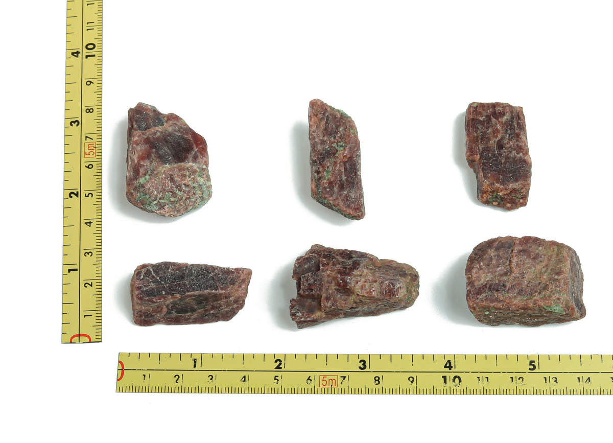 Raw Garnet gemstone from GemstoneGO, showcasing a deep red, uncut natural mineral with rough texture and earthy appearance.