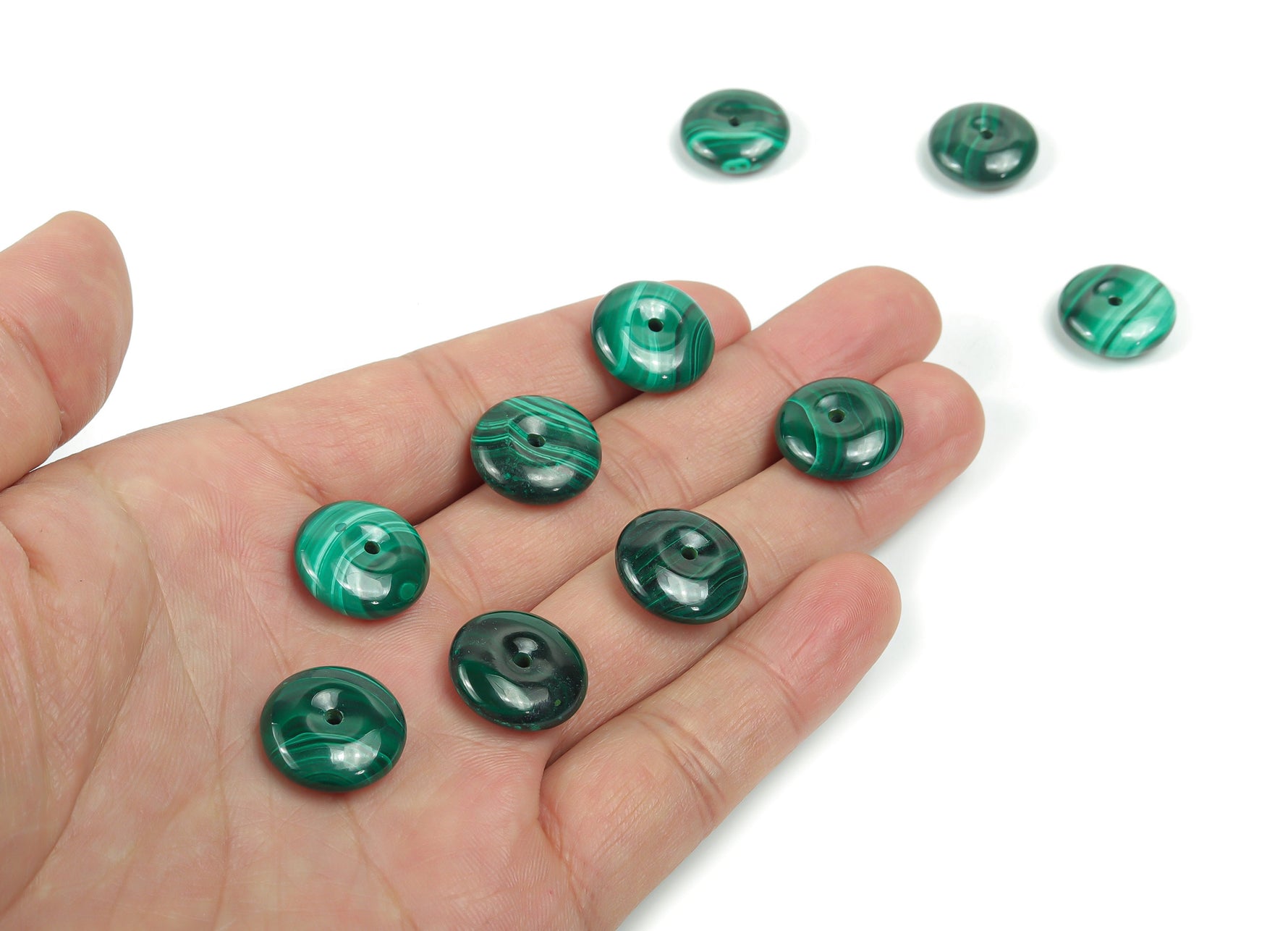Malachite crystal donut pendant from GemstoneGO with a 16mm Pi Stone, showcasing vibrant green banded patterns and polished finish.
