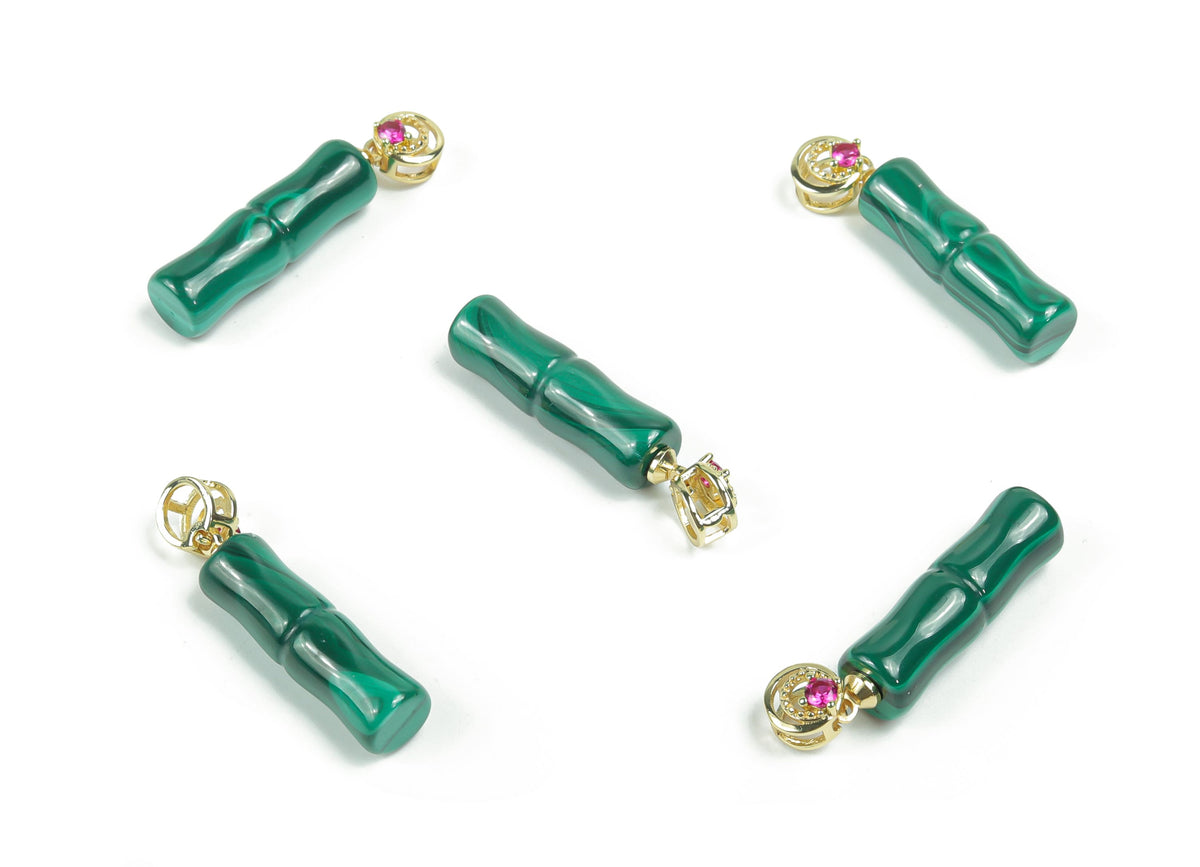 Malachite crystal pendant from GemstoneGO featuring a polished green stone with natural banding, hanging on a silver chain.