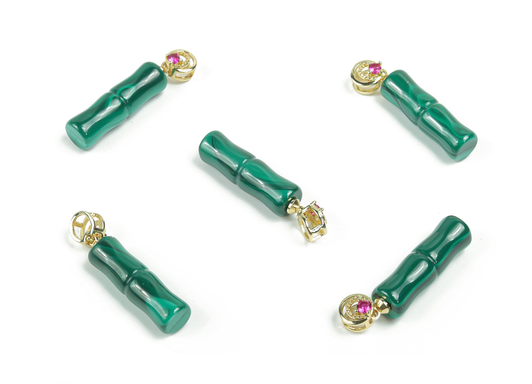 Malachite crystal pendant from GemstoneGO featuring a polished green stone with natural banding, hanging on a silver chain.