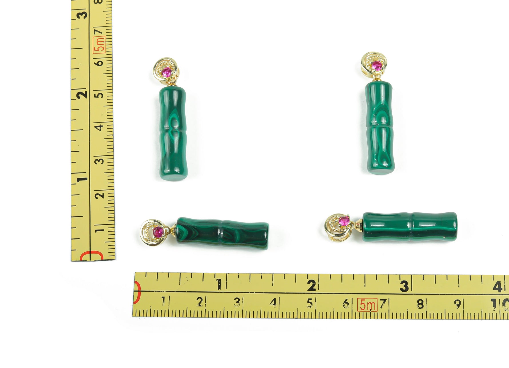 Malachite crystal pendant from GemstoneGO featuring a vibrant green, polished stone pendant on a silver chain.