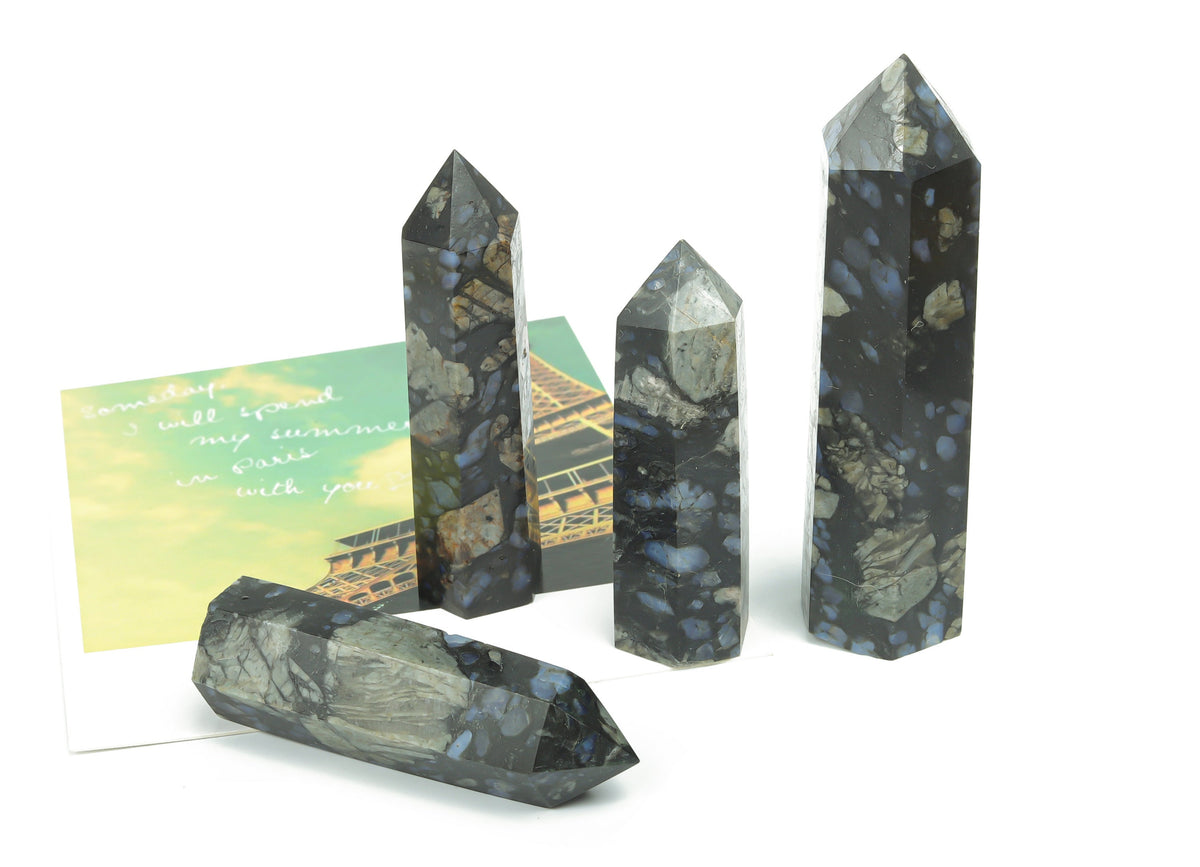 Blue Liberite quartz obelisk tower gemstone from GemstoneGO, detailed crystal with a polished finish.