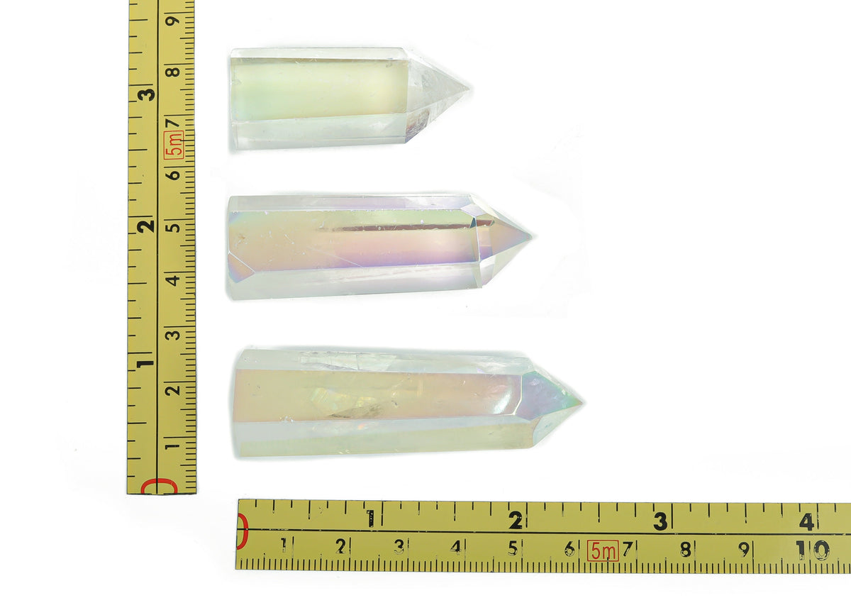 Angel Aura Quartz obelisk tower crystal by GemstoneGO, featuring a luminous, iridescent finish and pointed crystal structure.