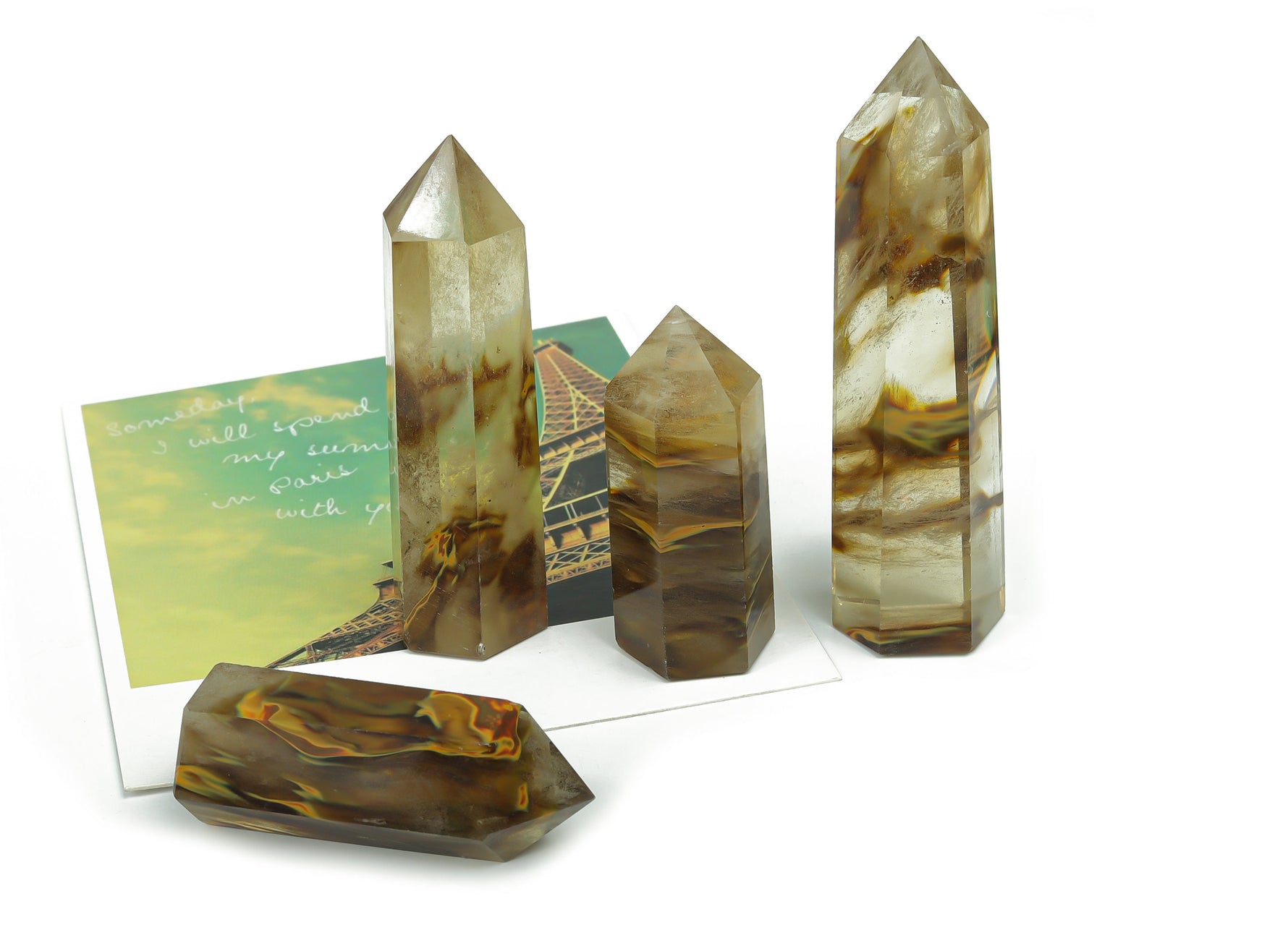 Yellow smelting quartz obelisk tower crystal from GemstoneGO, featuring a pointed yellow quartz crystal with natural stone details.
