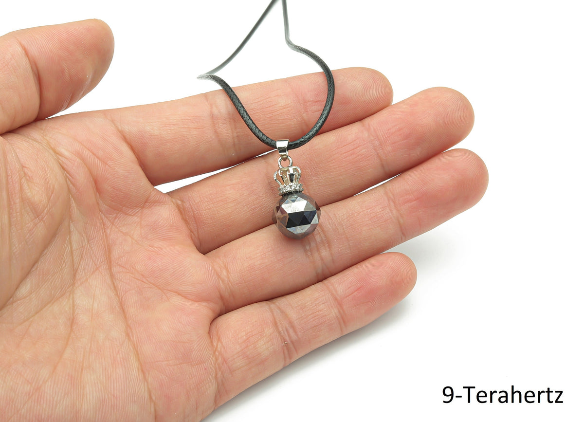 Terahertz crystal cord necklace featuring a healing gemstone, showcasing a polished gemstone pendant on a black cord.