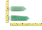 Aventurine obelisk tower crystal from GemstoneGO, featuring a polished green mineral with natural veining and pointed top.