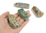 Azurite obelisk tower crystal from GemstoneGO, showcasing deep blue mineral formations with a polished pointed top.