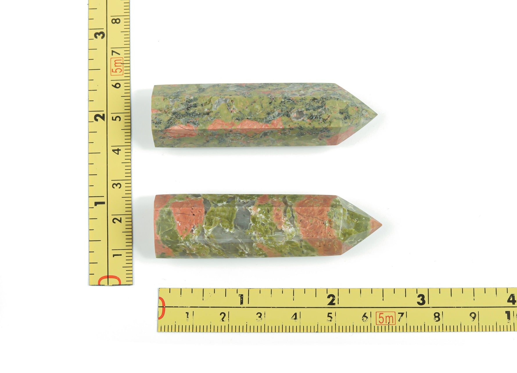 Unakite obelisk tower crystal from GemstoneGO, showing a polished green and pink gemstone obelisk with natural stone patterns.
