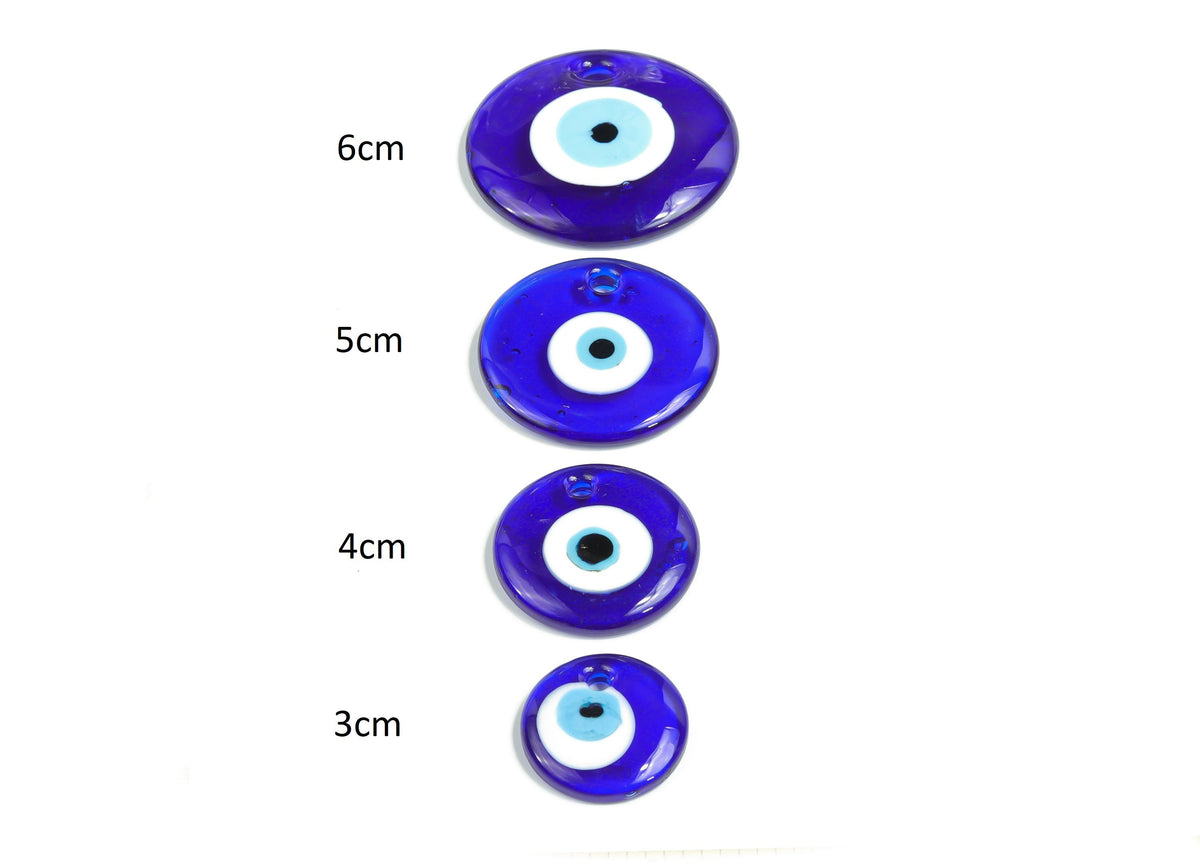 Blue glass evil eye pendant with hole for jewelry or home decor, featuring a protective evil eye design by GemstoneGO.