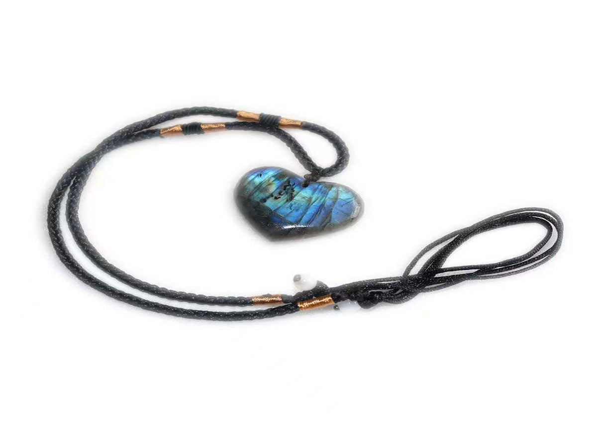 Labradorite heart crystal necklace from GemstoneGO featuring a polished labradorite pendant on a silver chain.
