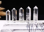 Clear Quartz Obelisk Tower crystal from GemstoneGO, showing a transparent, polished quartz crystal with natural facets.