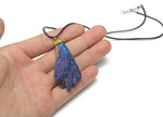 Blue Aura Kyanite fan crystal necklace with cord, featuring vibrant blue and iridescent gemstone pendant by GemstoneGO.