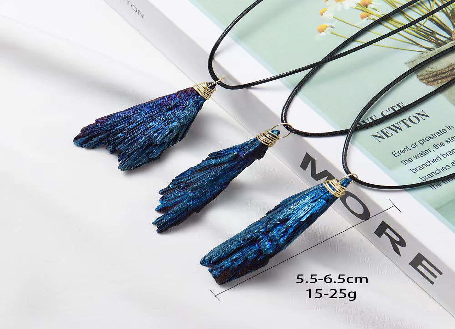 Blue Aura Kyanite fan crystal necklace on a cord, featuring vibrant blue and iridescent gemstone pendant from GemstoneGO.
