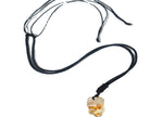 Citrine crystal pendant on a cord necklace from GemstoneGO, showcasing a polished orange gemstone with a silver clasp.