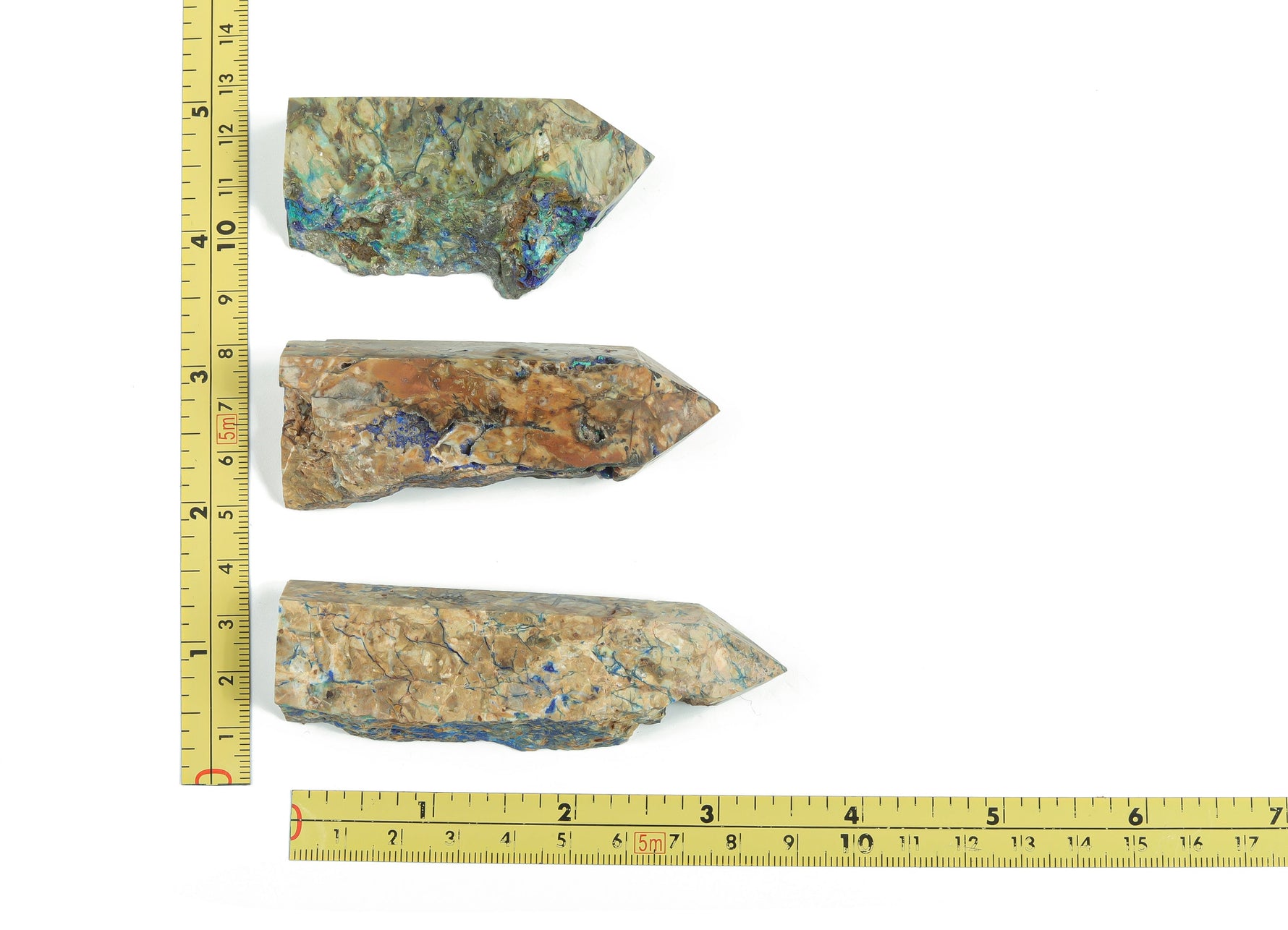 Azurite obelisk tower crystal from GemstoneGO, showcasing a deep blue gemstone with natural veining and a polished pointed tip.