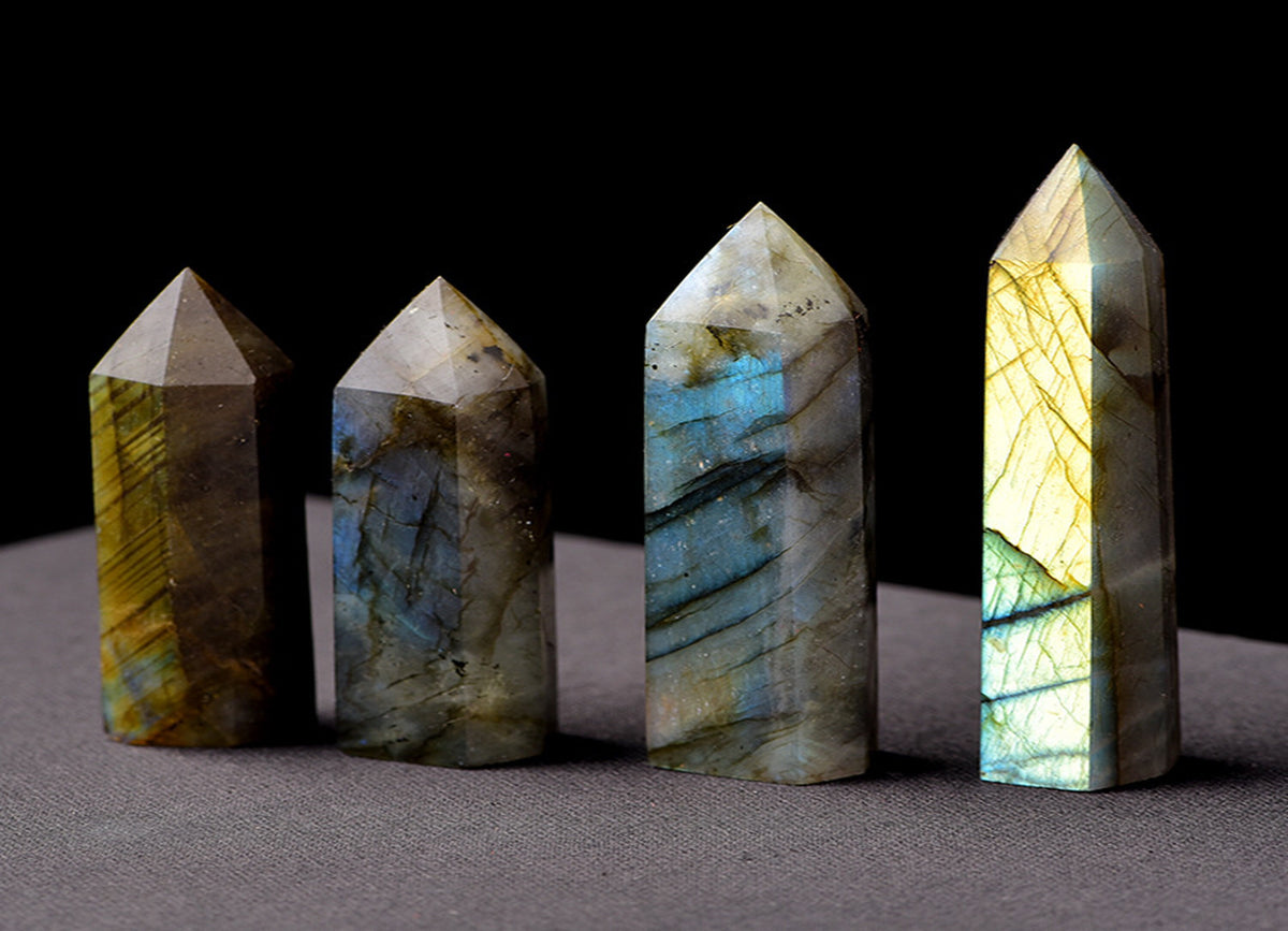 Labradorite obelisk tower crystal from GemstoneGO, featuring iridescent blue and green hues with smooth polished surfaces.