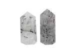 Tourmalinated Quartz obelisk tower crystal by GemstoneGO, featuring black tourmaline inclusions in clear quartz.