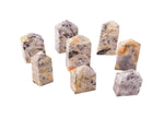 Crazy Lace Agate obelisk crystal tower by GemstoneGO, featuring vibrant, swirling patterns and a polished pointed shape.