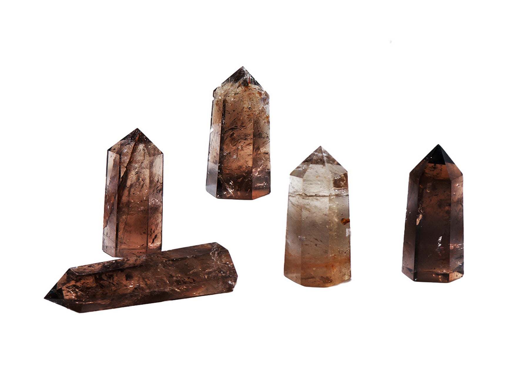 Smoky Quartz obelisk tower crystal from GemstoneGO, featuring a polished, dark brown and gray stone with a pointed top.