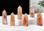 Flower Agate obelisk tower crystal with cherry blossom pattern, showcasing pink and white mineral formations by GemstoneGO.
