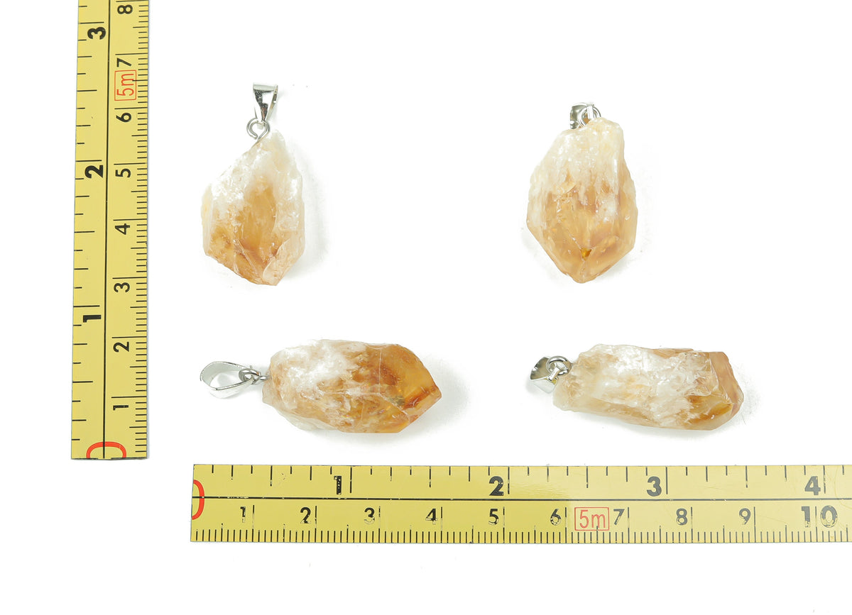 Citrine crystal pendant from GemstoneGO, showcasing a polished yellow-orange gemstone for jewelry making supplies.