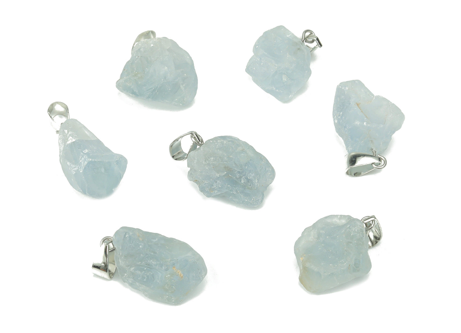 Celestite crystal pendant from GemstoneGO, showing a blue and white gemstone shaped for jewelry making on a jewelry-making supply background.