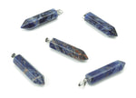 Sodalite point crystal pendant from GemstoneGO, used in jewelry making, showcasing a vibrant blue mineral with natural veining.