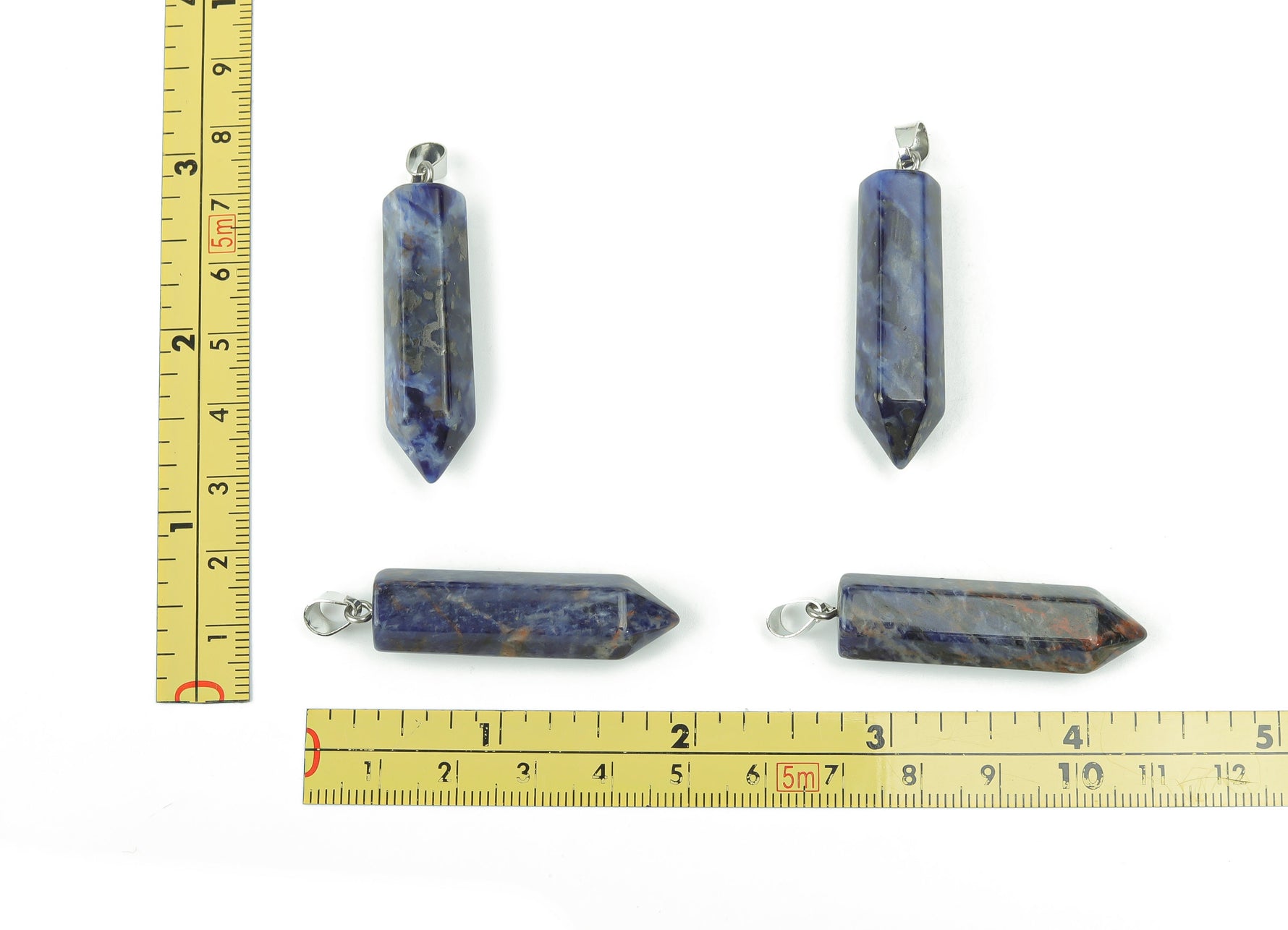 Sodalite point crystal pendant from GemstoneGO, ideal for jewelry making, with deep blue and white mineral patterns.