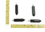 Obsidian point crystal pendant from GemstoneGO, showcasing a sleek black gemstone with natural facets, ideal for jewelry making.