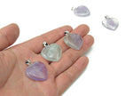 Green fluorite heart crystal pendant from GemstoneGO, ideal for jewelry making, showcasing a polished heart-shaped gemstone.